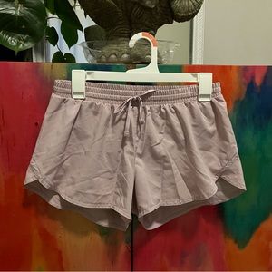 Old Navy active pink shorts. Built in liner. Size small.